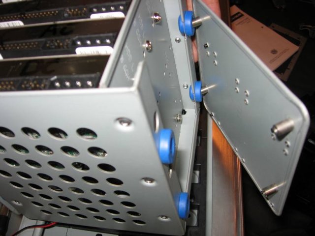 Hard drive cage, vibration isolators.