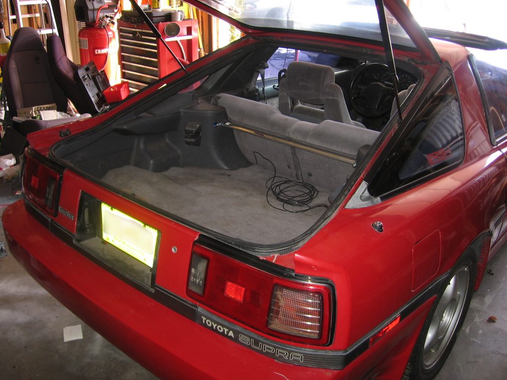 Rear shot of the supra, all buttoned up. Strut tower bar is in, and the interior is finito.