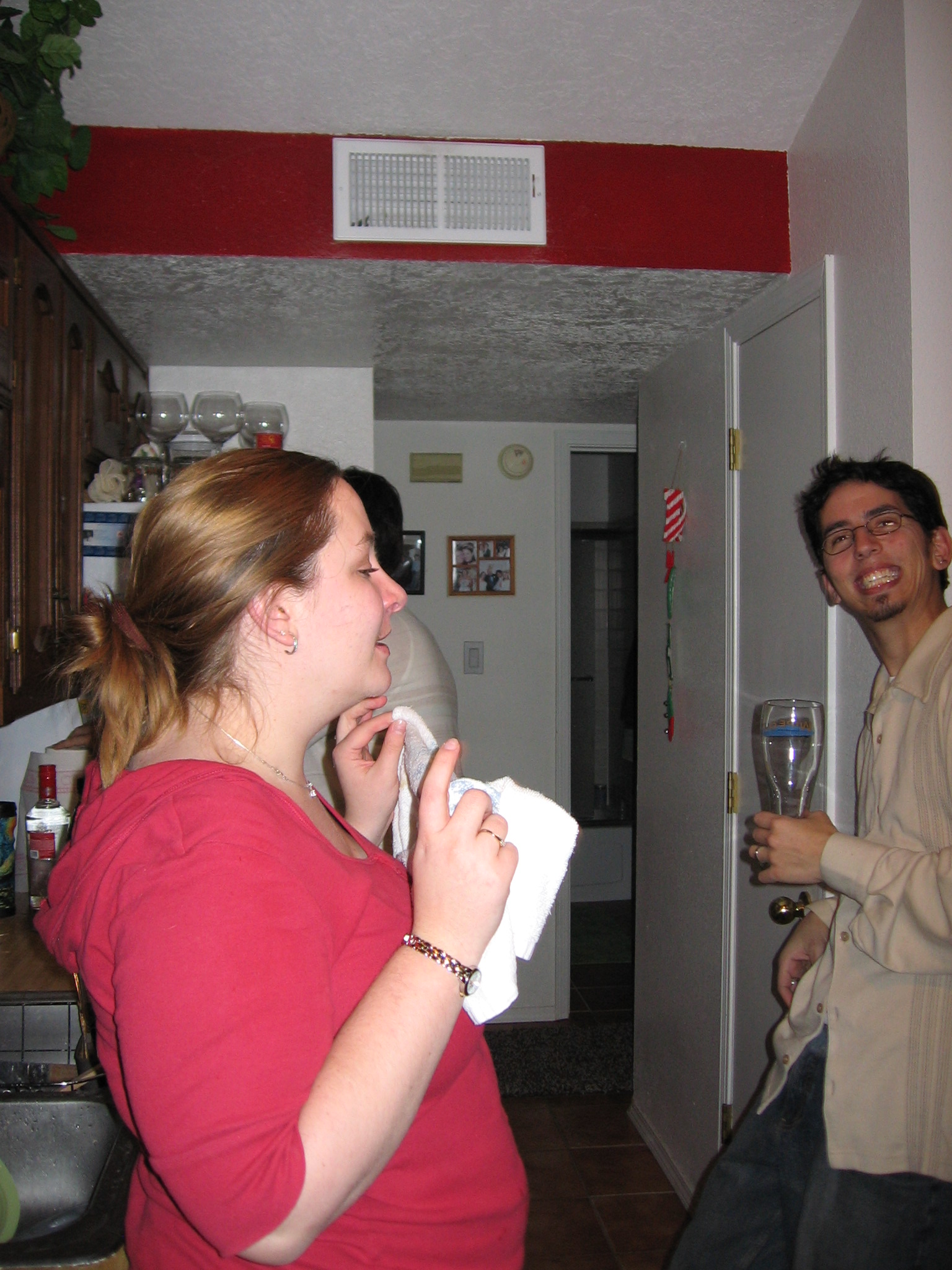 Cory overly amused with himself, Tara... holding a rag?