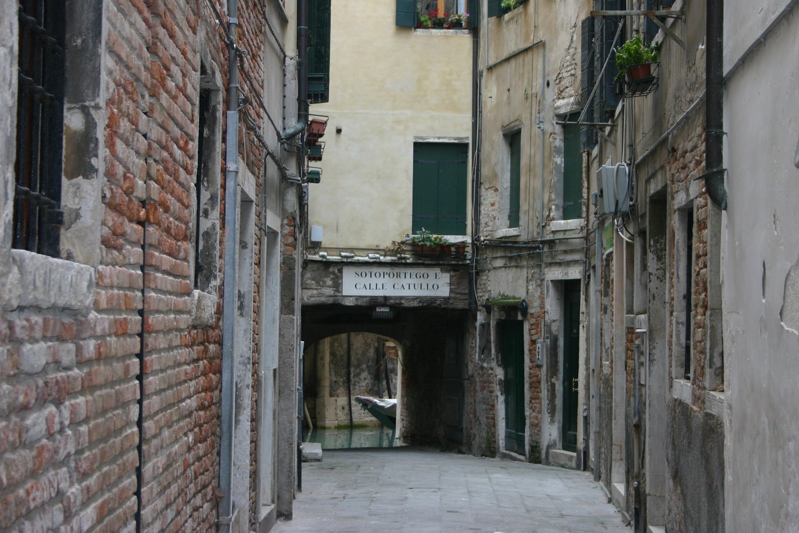 A view down the road towards water.