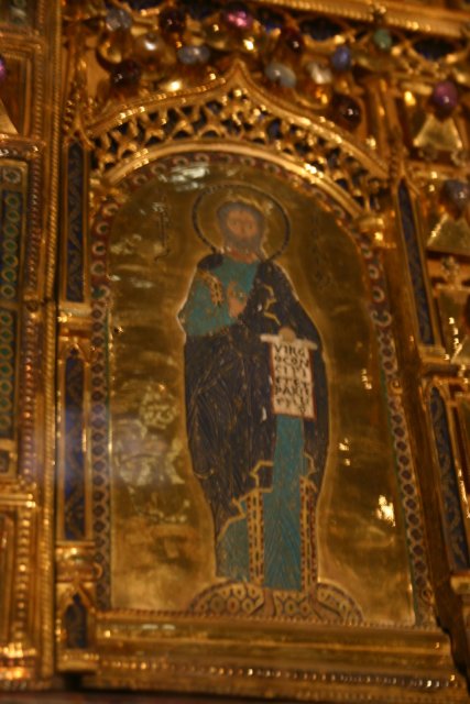 A close up view of one of the saints in the altar.