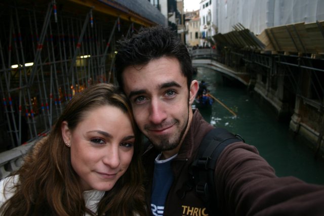 Another infamous self-portrait, waterway and gondola in the background.