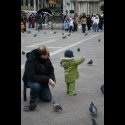 A little kid waving.