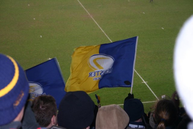 Leinster just got a try, pulling us ahead, waving the leinster flag in celebration.