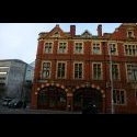 A brightly colored building west of Dublin City Centre.