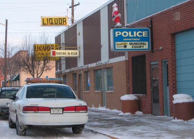 Police Station... Next to a Liquor store