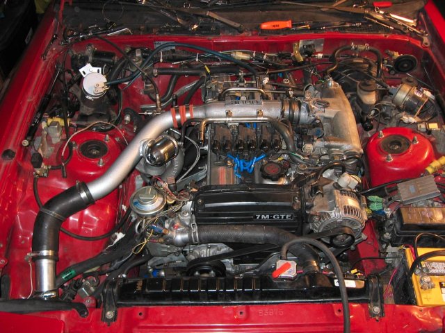 Engine bay 95% complete. IC Pipes all run, Turbo done, Coolant done.