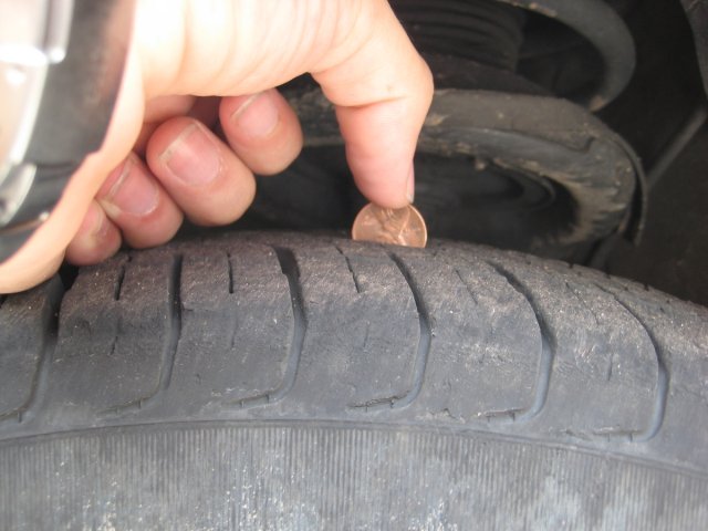 3-4 month old tires. Maybe I had the penny too close to the outside of the tire? Eh, fugg it.