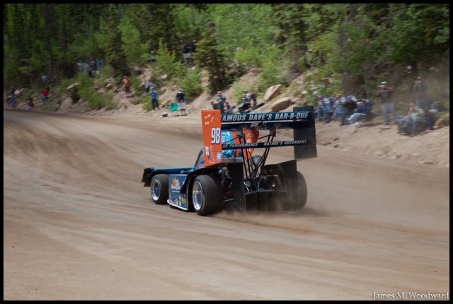 Dallenbach's car getting up the straight.